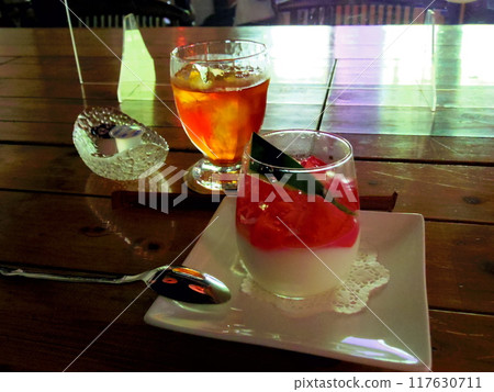 Watermelon almond dessert and iced tea 117630711