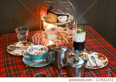 Afternoon tea at a stylish cafe Afternoon tea at a stylish cafe 117631721