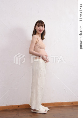 Young pregnant woman 117631743