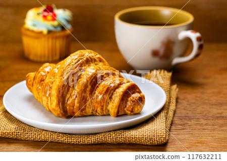 Freshly baked delicious french croissant.. Freshly baked delicious french croissant.. 117632211