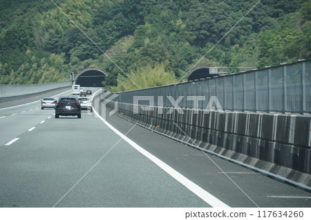 Cars traveling on the highway 117634260