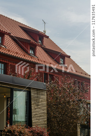The side view house with red tiled roof . High quality photo The side view house with red tiled roof . High quality photo 117635491