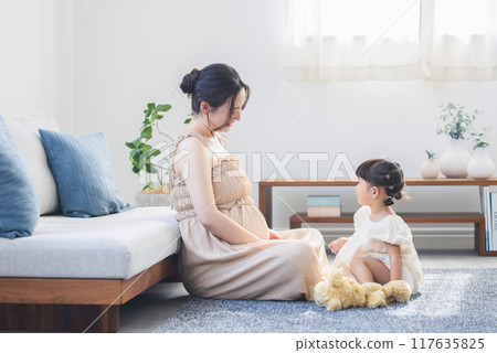 Parent and child spent in the living room Parent and child spent in the living room 117635825