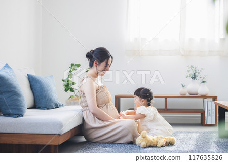 Parent and child spent in the living room Parent and child spent in the living room 117635826