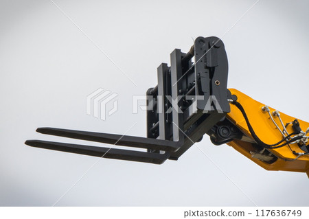 Forklift loader or stacker. Hydraulic and pneumatic mechanism in machine. Technology in transport 117636749