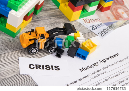 Houses made of toy blocks, mortgage agreement form and money 117636783