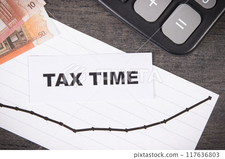 Inscription tax time, euro banknotes and rising graph showing tax increases 117636803