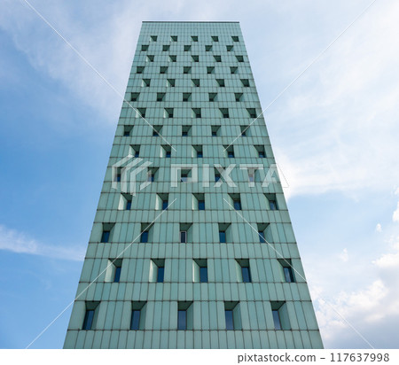 Hamburg, Germany, July 19, 2024 - Headquarters of the Deutsche Bank, a major financial institution with contemporary glass office building Hamburg, Germany, July 19, 2024 - Headquarters of the Deutsche Bank, a major financial institution with contemporary glass office building 117637998