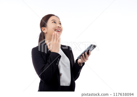 Portrait young asian businesswoman in suit gesture surprised while looking smartphone isolated. 117638094