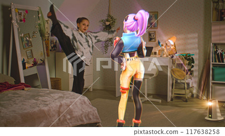 Teen girl chats with 3D animated avatar, shows gymnastics skills in bedroom Teen girl chats with 3D animated avatar, shows gymnastics skills in bedroom 117638258