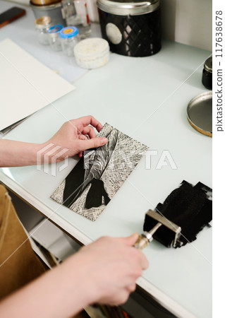 Artisan with artwork and paintroller Artisan with artwork and paintroller 117638678