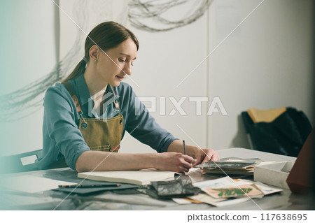 Thinking of new ideas while drawing 117638695