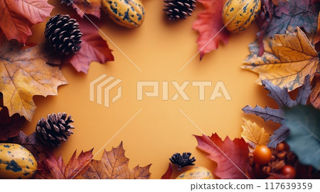 Colorful autumn leaves arranged around a textured background 117639359