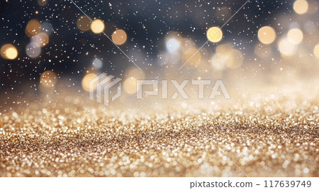 Golden glittery background with sparkling effects in a dark setting 117639749
