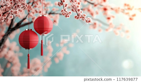 Red lanterns hanging from cherry blossom branches during a serene spring evening 117639877