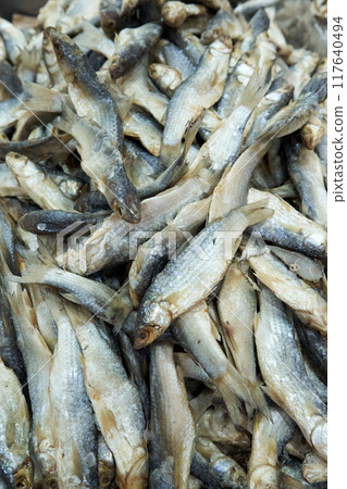 A large assortment of dried fish is on display in the Asian store. A large assortment of dried fish is on display in the Asian store. 117640494
