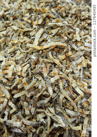 A large assortment of dried fish is on display in the Asian store. A large assortment of dried fish is on display in the Asian store. 117640495