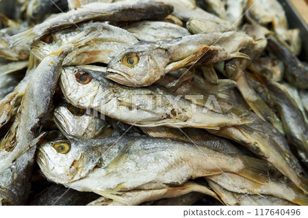A large assortment of dried fish is on display in the Asian store. A large assortment of dried fish is on display in the Asian store. 117640496