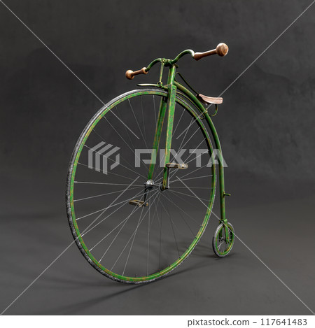 Retro Penny-farthing bicycle against black background 117641483