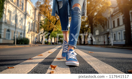 Woman Walking on Street in City Woman Walking on Street in City 117641517