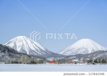 Winter ranch: Mt. Shiribetsu (left) and Mt. Yotei (right), Kimobetsu Town 117642506