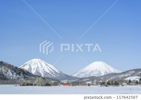 Winter ranch: Mt. Shiribetsu (left) and Mt. Yotei (right), Kimobetsu Town Winter ranch: Mt. Shiribetsu (left) and Mt. Yotei (right), Kimobetsu Town 117642507