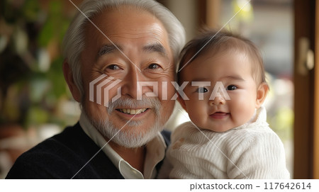 Grandfather holding a baby 117642614