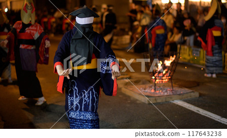A woman dancing in an indigo-dyed yukata and a Hikozono hood at the Nishimonai Bon Odori Festival in Akita Prefecture, 2024 117643238