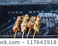 Grilled chicken on a grill 117643918