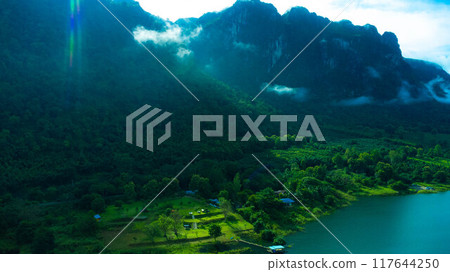 Beautiful view of mountains with fog in Kanchanaburi, Thailand Beautiful view of mountains with fog in Kanchanaburi, Thailand 117644250