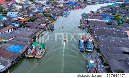 Aerial view of fishing village and gulf at Pak Nam Sichon, estuary area in Chumphon Province, Thailand. Aerial view of fishing village and gulf at Pak Nam Sichon, estuary area in Chumphon Province, Thailand. 117644271