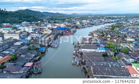 Aerial view of fishing village and gulf at Pak Nam Sichon, estuary area in Chumphon Province, Thailand. Aerial view of fishing village and gulf at Pak Nam Sichon, estuary area in Chumphon Province, Thailand. 117644282