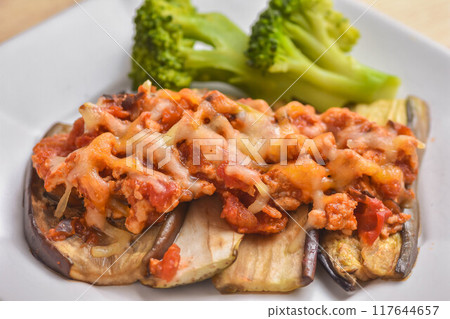 Grilled eggplant with tomato sauce and cheese 117644657