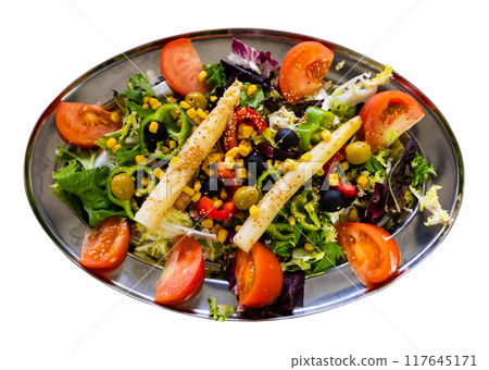 Vibrant light Mediterranean fresh vegetable salad on metal platter Vibrant light Mediterranean fresh vegetable salad on metal platter 117645171