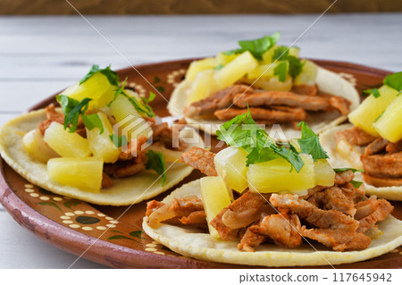 Tacos al pastor (Mexican cuisine) 117645942