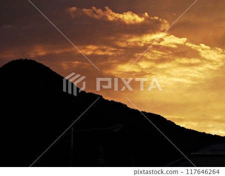 sunset over the mountain 117646264