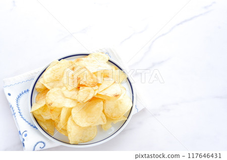 potato chips on a plate 117646431