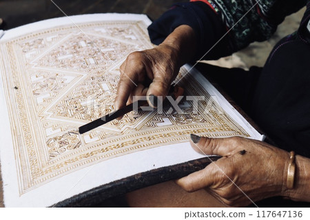 Traditional Hmong craftsmanship: rouge dyeing Traditional Hmong craftsmanship: rouge dyeing 117647136