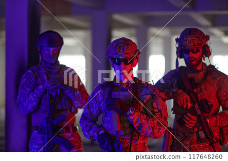 Soldier squad team walking in urban environment colored lightis Soldier squad team walking in urban environment colored lightis 117648260