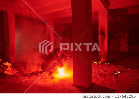 A professional cameraman captures the intense moments as a group of skilled soldiers embarks on a dangerous mission inside an abandoned building, their actions filled with suspense and bravery A professional cameraman captures the intense moments as a group of skilled soldiers embarks on a dangerous mission inside an abandoned building, their actions filled with suspense and bravery 117648290