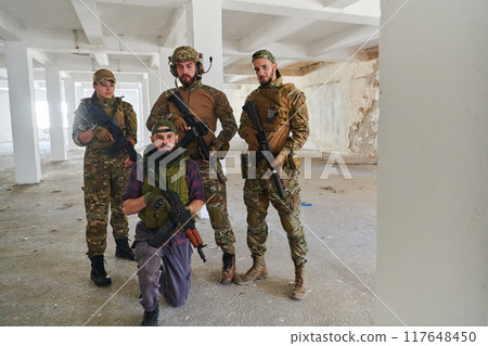 Soldier squad team portrait in urban environment Soldier squad team portrait in urban environment 117648450