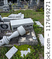 Unmaintained collapsed gravestone 1 117649271