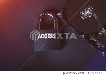 Saving user data. Hacking a password on a PC. Closing access to files. Hackers and secret data. HDD and key with lock. Saving user data. Hacking a password on a PC. Closing access to files. Hackers and secret data. HDD and key with lock. 117649733