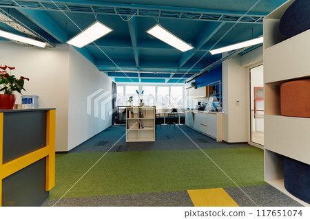 Photo of a modern office where programming, digital marketing and web design projects are done. Office with modern furniture and glass office Photo of a modern office where programming, digital marketing and web design projects are done. Office with modern furniture and glass office 117651074