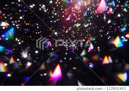 Festive Colorful Light Rays and Particles bokeh on dark background 117652451