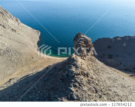 Lake Baikal. Angel Rock. Warm autumn days. 117654212