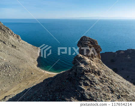 Lake Baikal. Angel Rock. Warm autumn days. 117654214