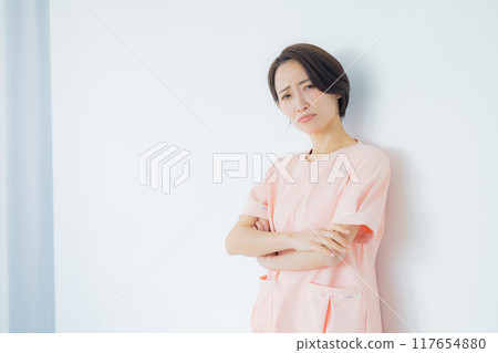 Worried nurse Worried nurse 117654880