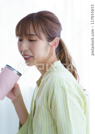 Young woman preparing to start a business in the office Young woman preparing to start a business in the office 117655653