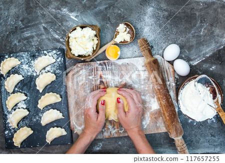 Process of making of varenyky with cheese, view from above 117657255